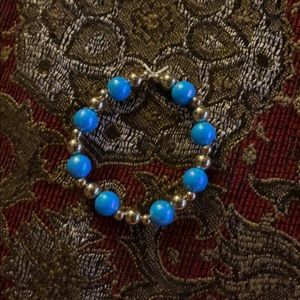 Handmade blue pearl with golden bracelet